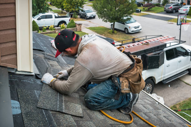 Professional Roof Replacement technician working in Eldorado, OH